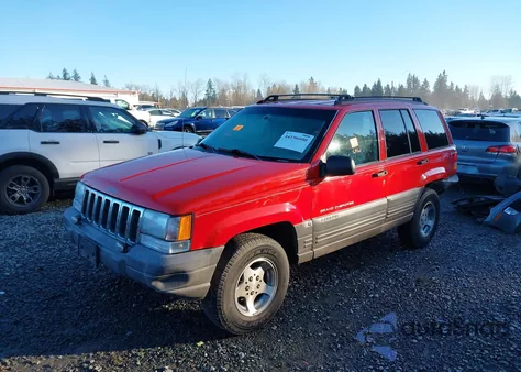 1998 Jeep Grand Cherokee Laredo z USA, uszkodzony, nr VIN 1J4GZ58S7WC142354